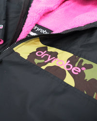 Flat detail studio shot of Dryrobe® Black pink camo remix