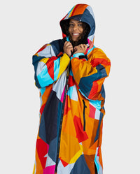 Woman wearing dryrobe Advance Abstract with hood and zip up