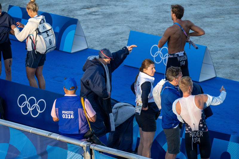 Mixed team triathlon event at the Paris 2024 Gamed with a swimmer wearing a Dryrobe as they prepare to get in the water