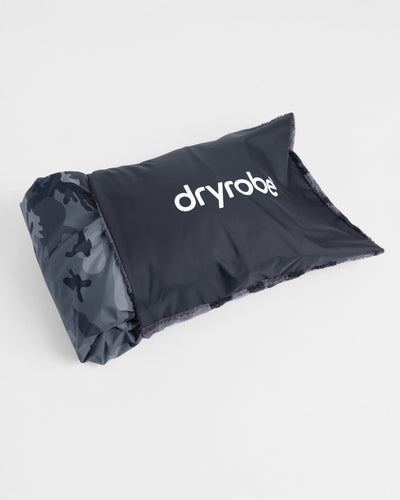 Studio Shot of Dryrobe® black camo cushion cover with Dryrobe® LS inside 