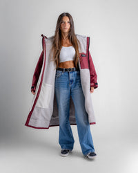 Female in studio wearing AW25 Burgundy Dryrobe® advance long sleeve 