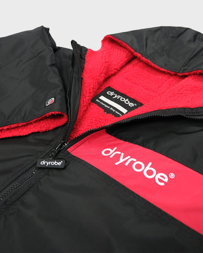 Flat detail studio shot of Dryrobe® Black red remix