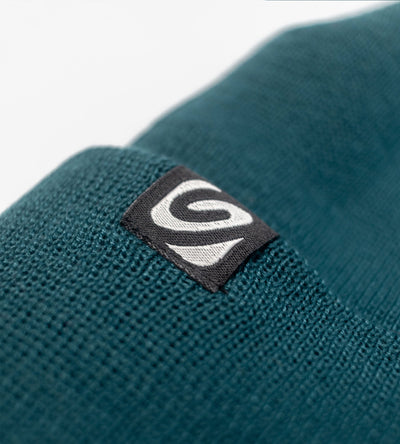 Flat studio shot of deep sea blue Dryrobe® Beanie hat 