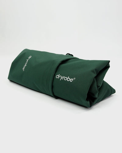 Dryrobe® green poncho rolled up