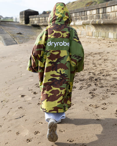 Kids camo grey Dryrobe® remix on beach 