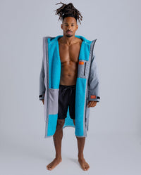 *MALE* in studio wearing 2025 LTD edition RNLI Dryrobe®