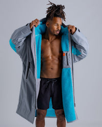 *MALE* in studio wearing 2025 LTD edition RNLI Dryrobe®