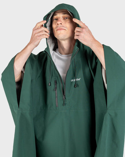 **MALE** Adult wearing Dryrobe® poncho Green in studio