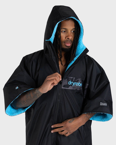 Adult Male in studio wearing black blue remix Dryrobe®