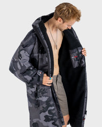 *MALE* wearing Black Camo dryrobe® Advance Long Sleeve unzipped