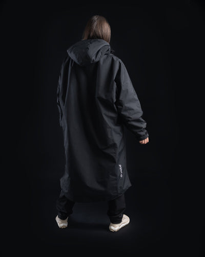 *FEMALE* Person wearing a black Nexus on a black background