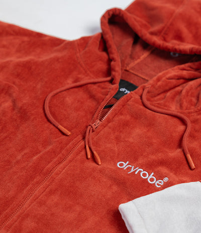 Red hooded towel with 'dryrobe' logo on a white background
