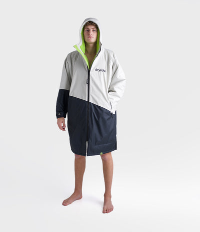 *MALE* Person wearing a grey and navy hooded garment on a white background