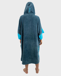 *MALE*Person wearing a teal hooded towel with blue sleeves on a white background