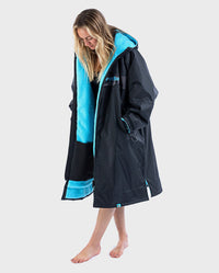 Woman wearing Black Blue Camo dryrobe® Advance REMIX Range 