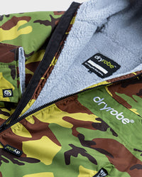 Close up of logo on dryrobe Advance Long Sleeve REMIX Range change robe in Camo Grey Green