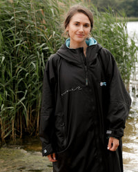 Close up of woman wearing Stay Wild dryrobe® Advance