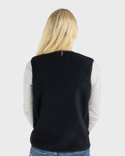 female in studio in Dryrobe® fleece gilet