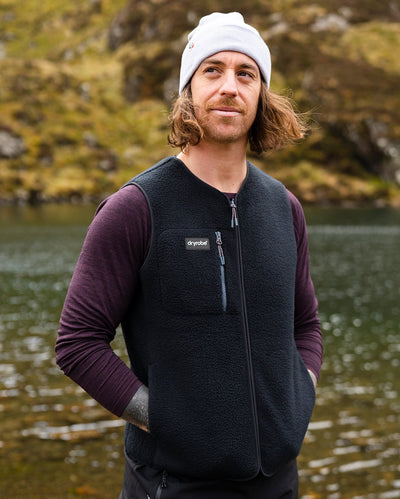 **MALE** Male in Dryrobe® fleece gilet in front of a lake