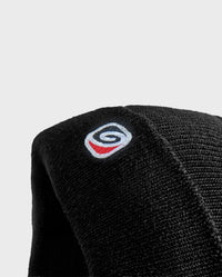 Close up of wave symbol on Black dryrobe® Eco beanie 