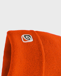 Close up of logo on Orange dryrobe Beanie