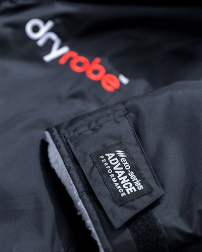Close up of end of sleeve on Black Grey dryrobe® Advance Long Sleeve