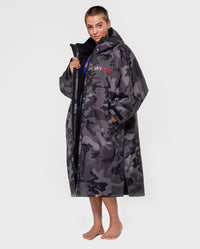 Woman wearing Black Camo dryrobe® Advance Long Sleeve unzipped