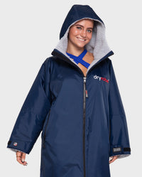 Woman wearing Navy Grey dryrobe® Advance Long Sleeve with hood up