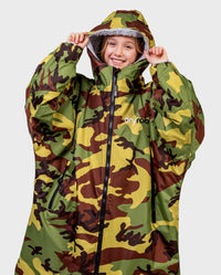 Girl wearing Camo Grey dryrobe® Advance Kids Long Sleeve with hood up