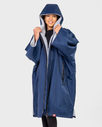 Girl wearing Kids dryrobe Advance Short Sleeve change robe in Navy Grey unzipped with hood up