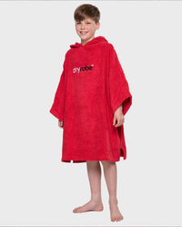 Boy wearing Red Kids Organic Towel robe with hood down