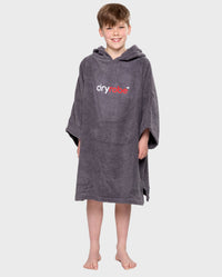 Boy smiling wearing Kids Towel Robe in Slate Grey