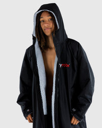 *MALE* wearing Black Grey dryrobe® Advance Long Sleeve unzipped