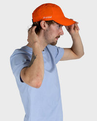 *MALE* Man stood facing the right, wearing  Orange dryrobe Quick Dry Cap