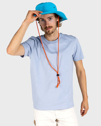 *MALE* Man wearing dryrobe Quick Dry Brim Hat in Blue, holding the brim with one hand 